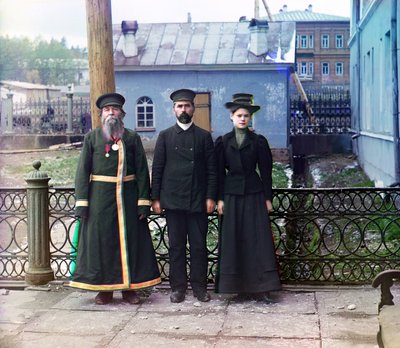 Three generations: A.P. Kalganov with son and granddaughter posed outdoors at the Zlatoust arms plant; the last two work in the shops of the plant, Russian Empire by Sergey Prokudin Gorsky